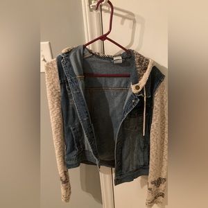 Jean jacket with sweater sleeves